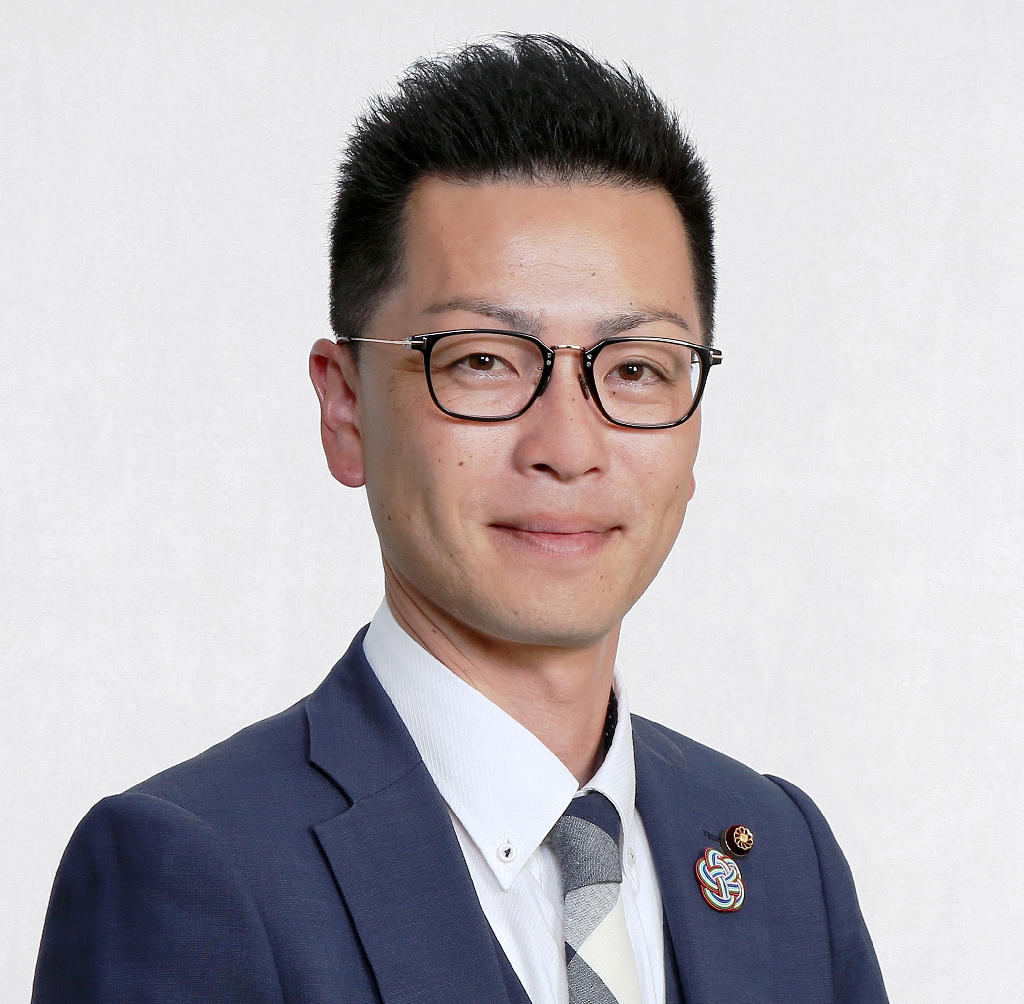 種清議員写真